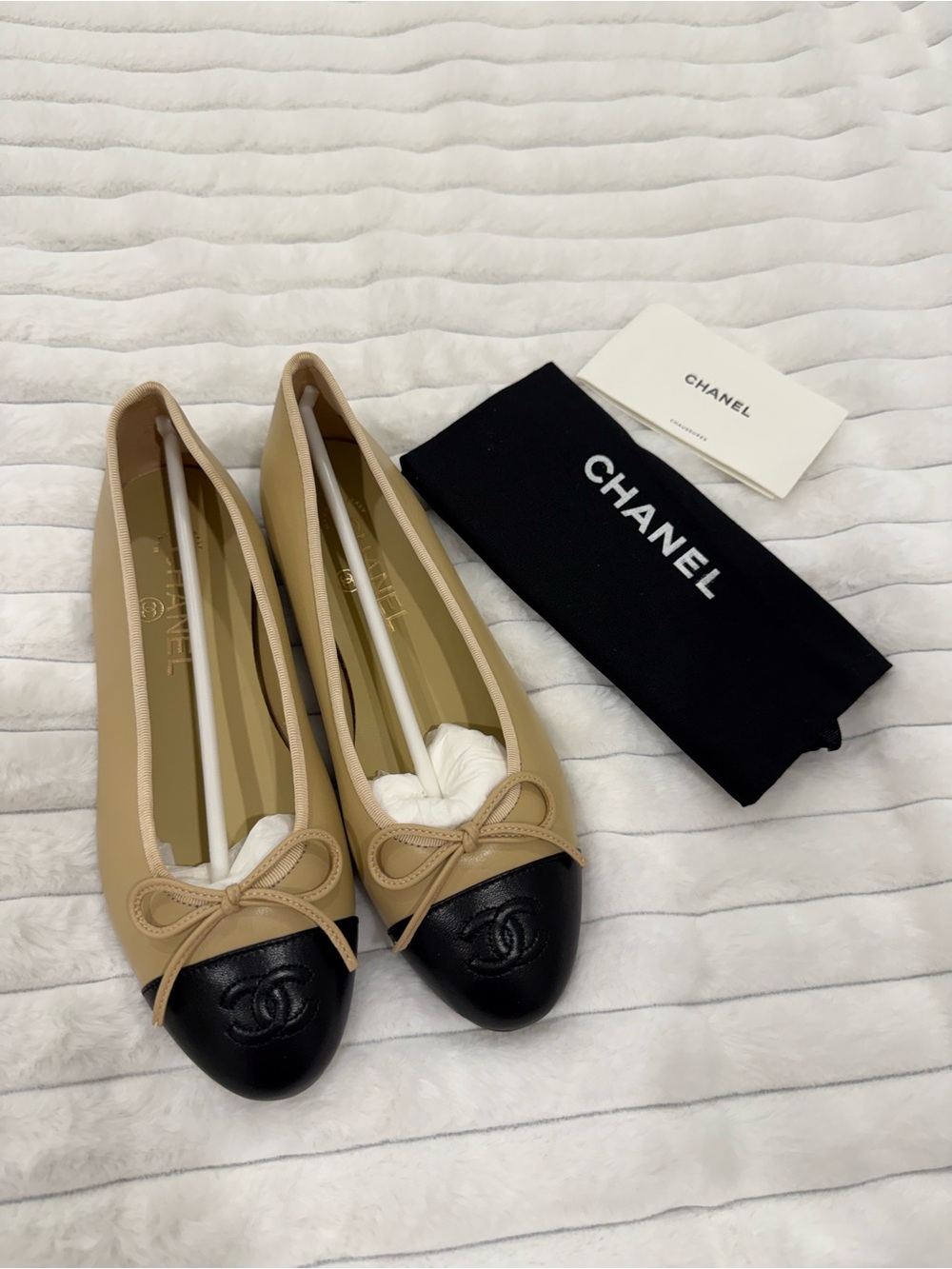 CHANEL Beige Leather Ballet Flats with Black Cap-Toe